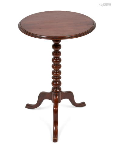 A Federal Carved and Figured Mahogany Tilt-Top
