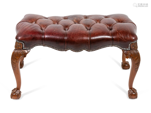 A George III Style Carved Mahogany Tufted-Leather