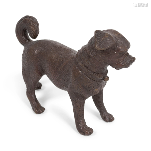 A Small Bronze Dog Height 5 x width 7 inches.