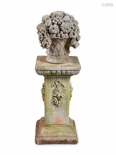 A Cast Stone Garden Ornament and Pedestal Overall