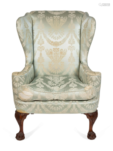 A George II Style Upholstered and Carved Mah…