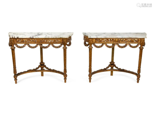 A Pair of Louis XVI Style Giltwood Consoles