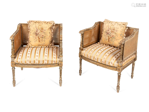 A Pair of Louis XVI Style Caned Giltwood Bergeres