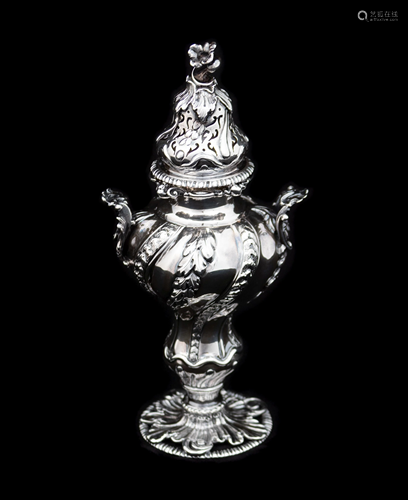 An Edwardian Silver Caster Height 7 3/4 inches.