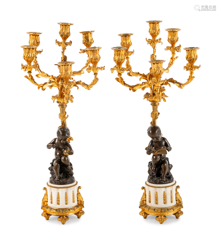 A Pair of Louis XVI Style Gilt and Patinated Bronze