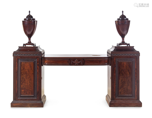 A George III Carved and Figured Mahogany Double