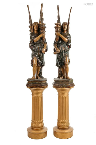 A Pair of Continental Carved and Painted Figural