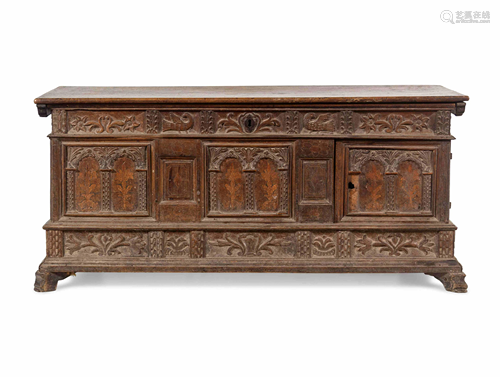 A Continental Carved and Inlaid Walnut Coffer