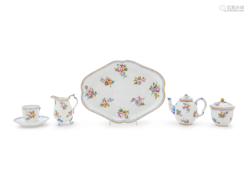 A Sevres Painted and Parcel Gilt Porcelain Tea Service