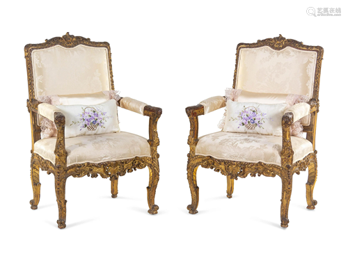 A Pair of Regence Style Carved Giltwood Fauteuils