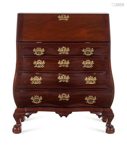 A Chippendale Style Carved Mahogany Bombe-Form