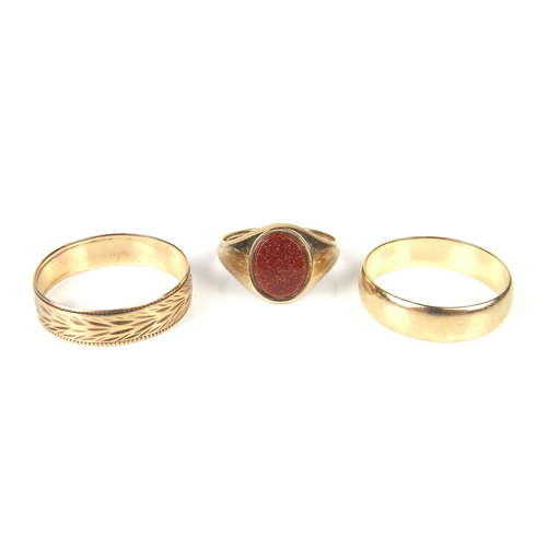 Three 9 ct yellow gold rings.