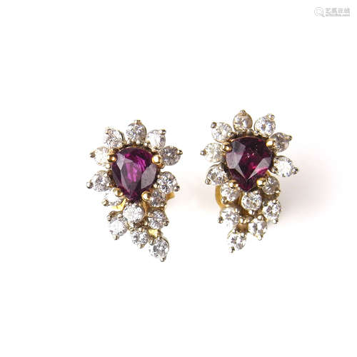 Yellow gold ruby and diamond cluster earrings.