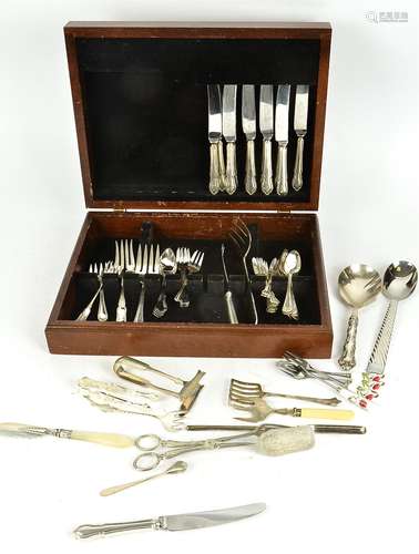 A partially filled canteen of cutlery, with an assortment of silver plated items from different