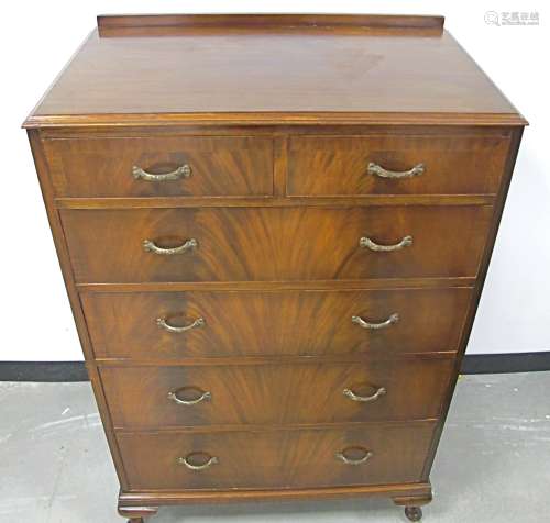 A 20th Century mahogany chest, of two short over four long graduated drawers, raised on cabriole