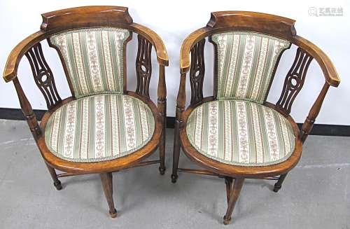 A pair of early 20th Century stained beech corner chairs, with boxwood stringing, central padded