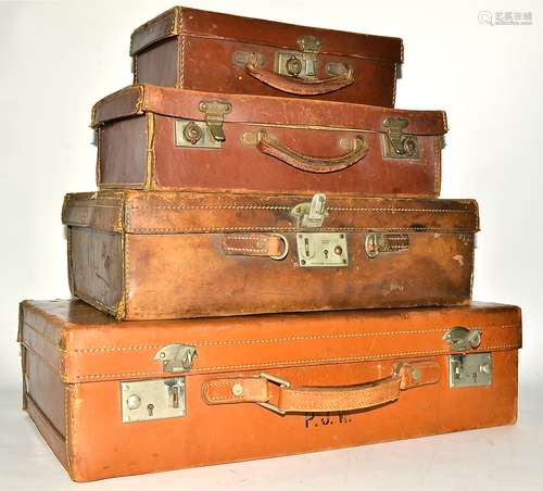 Four graduated leather cases, the largest 56cm x 33cm (4)