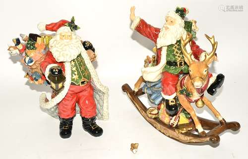 Two late 20th Century ceramic Christmas figures, one with Father Christmas on a rocking horse