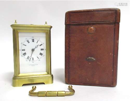 A mid 19th Century brass carriage clock, white enamel dial with Roman and Arabic numerals signed 'A.