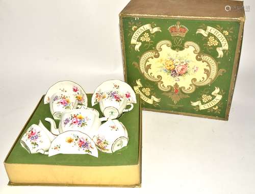 A Royal Crown Derby china tea set for two in original box, in the Posie pattern, with teapot, two