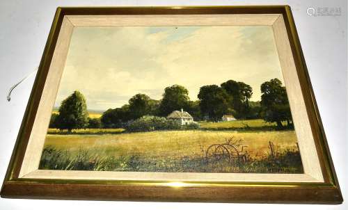 An oil on board landscape of a country cottage surrounded by fields, signed M. Jefferies, framed