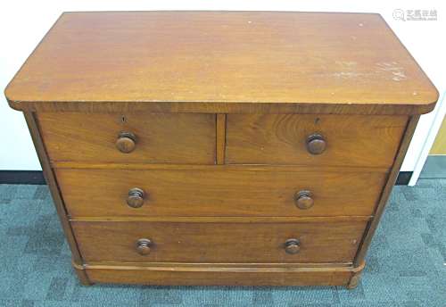 A Victorian mahogany chest, of two short above two long graduated drawers, rounded corners on plinth