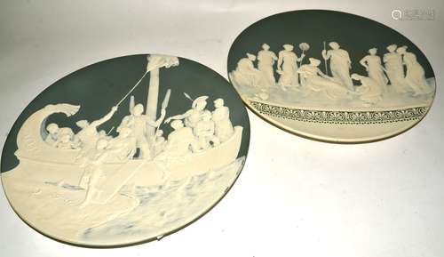 A pair of late 19th or early 20th Century Mettlach pâté-sur-pâté stoneware chargers, one depicting