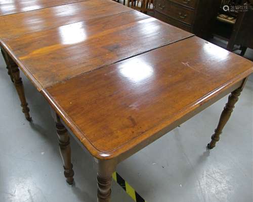 Two antique mahogany rectangular end tables, the tops having rounded corners and a moulded edge,