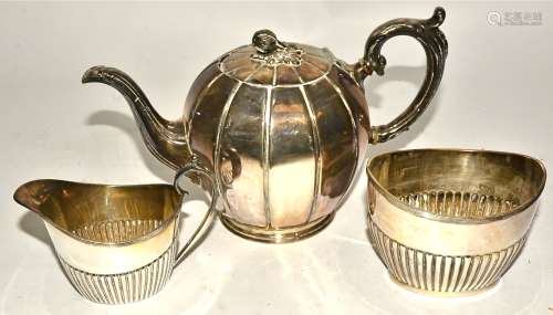 A late 19th or early 20th Century melon shaped silver plated teapot, retailed by A.H. Fielding of