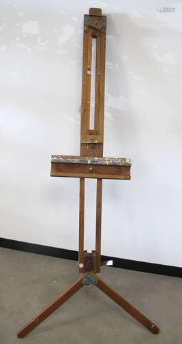 A mid Century artist's easel, with aluminium fittings, having some repair on a tripod support,