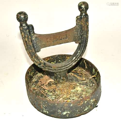 A cast iron boot scraper, of oval form, 28cm x 26cm