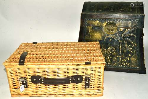 A modern casket and basket, the domed casket with panels of elephants, 42cm x 37cm, the wicker