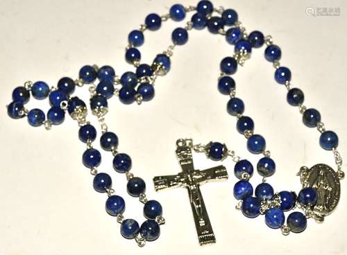 An Italian lapis lazuli rosary, consisting of strung beads, crucifix and prayer to Mary, length 58cm