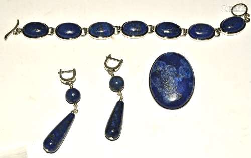 A lapis lazuli set, consisting of bracelet, brooch and 925 earrings, (3)