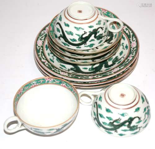 Three early 20th Century Chinese famille verte trios, with hand painted encircling dragons chasing