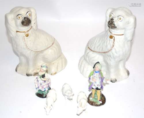 Three blanc de chine oxen, height 6cm, a pair of Continental figures and two Staffordshire spaniels,