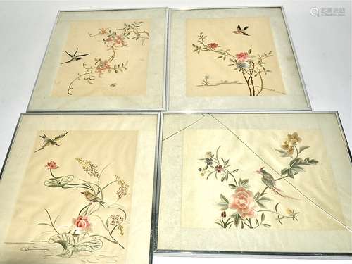 Four 20th Century Chinese silks with birds amidst flowers, each framed but some without glaze,