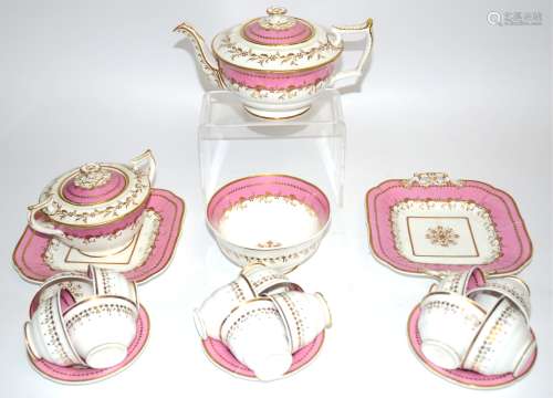 A Staffordshire tea service c1860, with pink borders, gilt floral decoration and finial, to