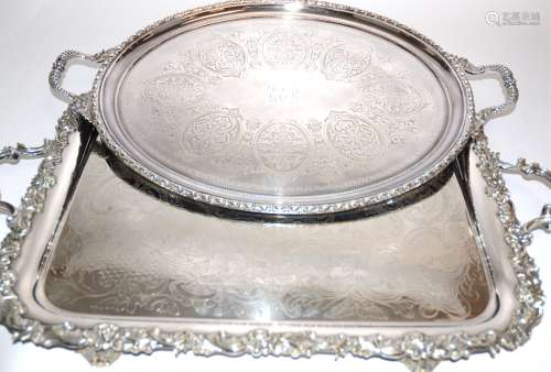An Oetzmann & Co of London twin handled rectangular silver plated tray, raised on four rococo