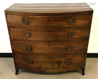 An early Victorian mahogany veneered bow front chest of drawers, four long drawers with brass