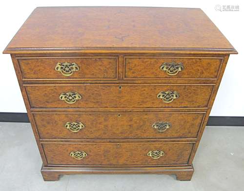 A contemporary Georgian style burr walnut chest, of two short and three graduated drawers, moulded