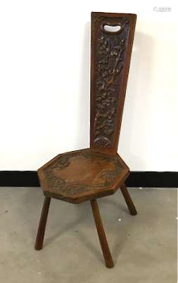 A Victorian oak hall chair, with branch and acorn moulded design and having shield to seat