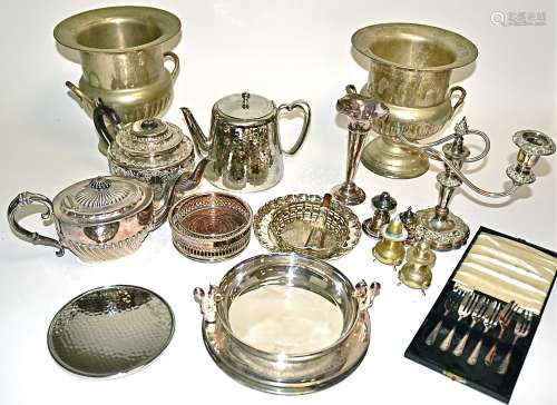 A quantity of silver plated wares, to include a candelabra, height 24cm, two wine bottle coasters,