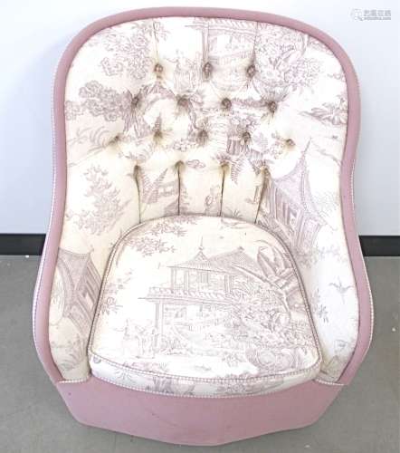 A contemporary Boudoir chair, button back with drop in fitted cushion, upholstered in a lilac and