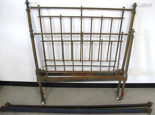 A Victorian single bed, with brass head and foot, metal side rails and a later slated wooden base