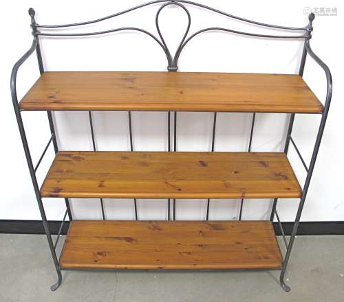 A contemporary wrought iron bookcase, with three fixed pine shelfs, 100cm x 32cm x 112cm