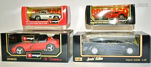 Four boxed Burago model vehicles, the 'Dodge Viper', 'Jaguar XJ220', the 'Ferrari Testa Rossa
