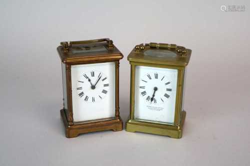A small French brass carriage clock, the white enamelled dial with black Roman numerals, marked