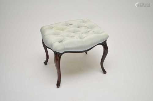 A late 19th century French upholstered rosewood stool, with a buttoned seat covered in a pale blue