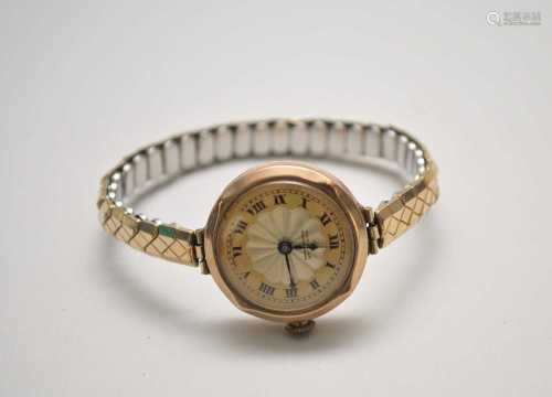 A yellow metal Lady's wristwatch